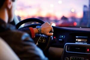 driving a car in singapore, behind the wheel of a car