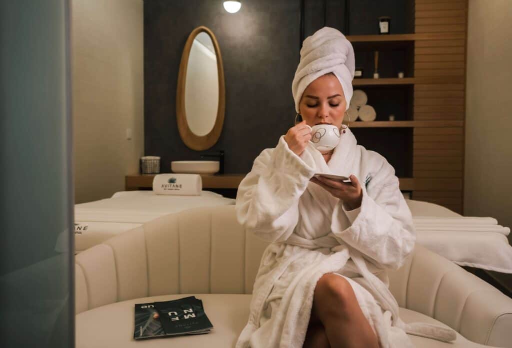 woman at spa drinking tea